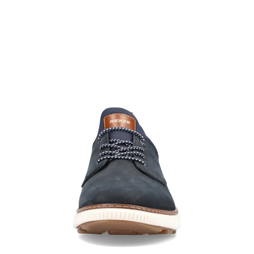 Modern Silhouette Rieker Men's Stan 60 Bungee Slip On in Navy
