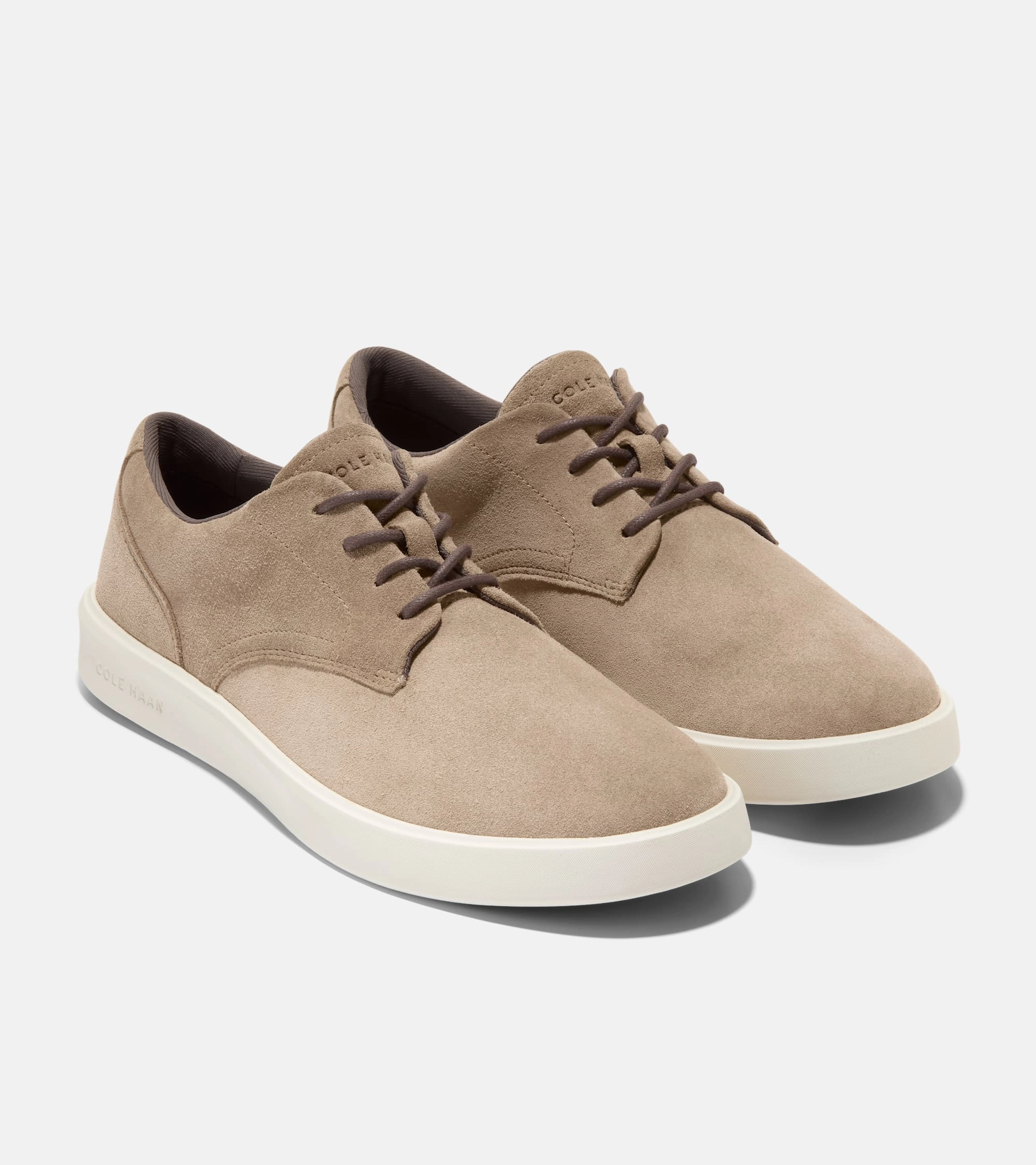 running in a park trail Training - session Cole Haan Men's Grand Crosscourt Daily Plain Toe Sneakers