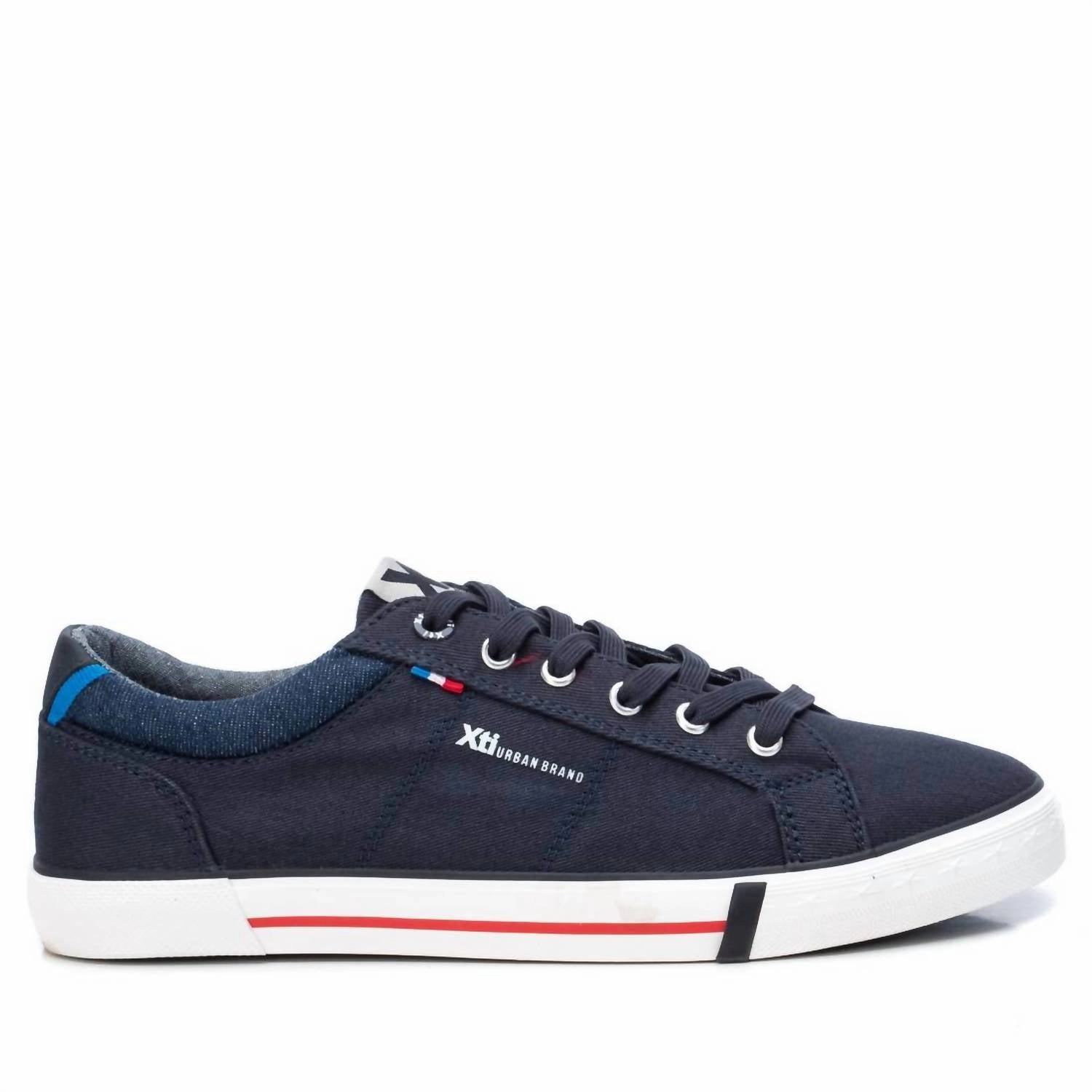 Men's Canvas Sneakers In Navy running on road