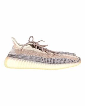 Adidas Yeezy Boost 350 V2 in Ash Pearl Synthetic Primeknit running in a river area shoes