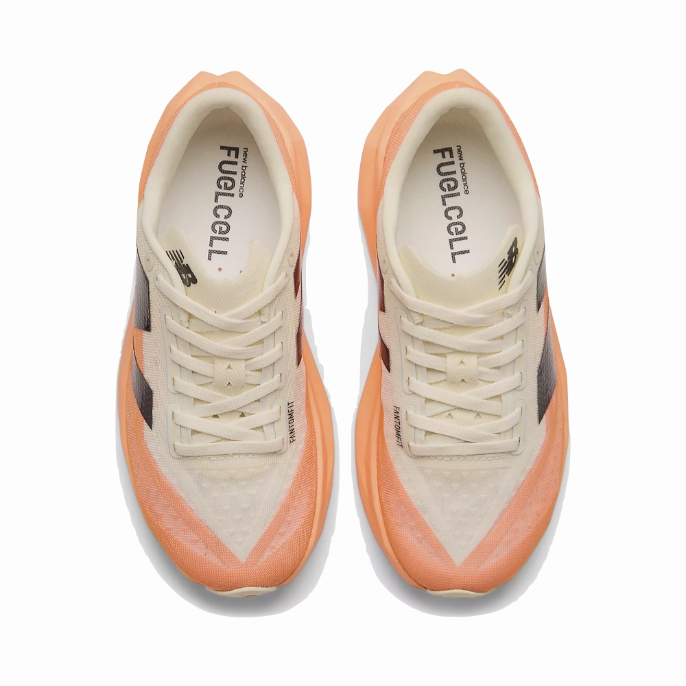 New Balance Women's FuelCell Rebel v4 Sneaker in Hot Mango/Angora/Black Ride Friendly Fashionable Fit