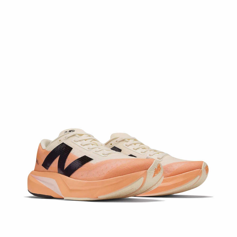 Wind Step Daily Wear New Balance Women's FuelCell Rebel v4 Sneaker in Hot Mango/Angora/Black