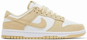 Nike Dunk Low SE Team Gold Suede running during a foggy day