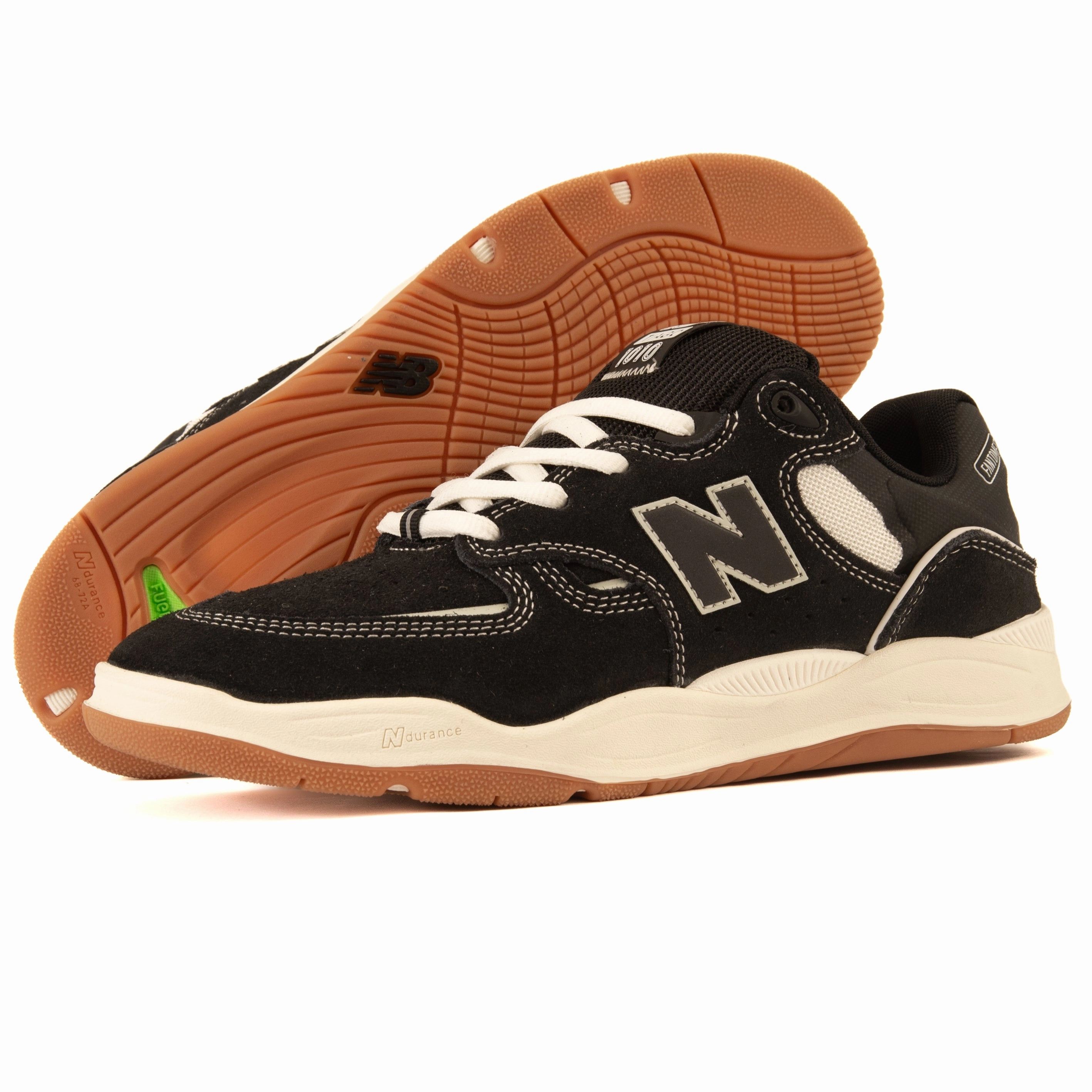 New Balance - 1010 SB (Black/White) running with a high - top design