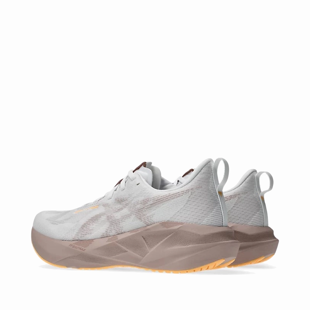 Smooth Design Daily Ease Asics Women's Novablast 5 Sneaker in White/Fawn