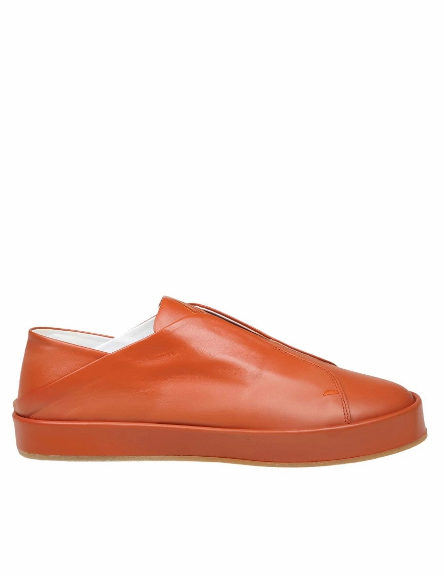 Slip On Sneakers In Orange Leather Ventilation holes round - toe shoes
