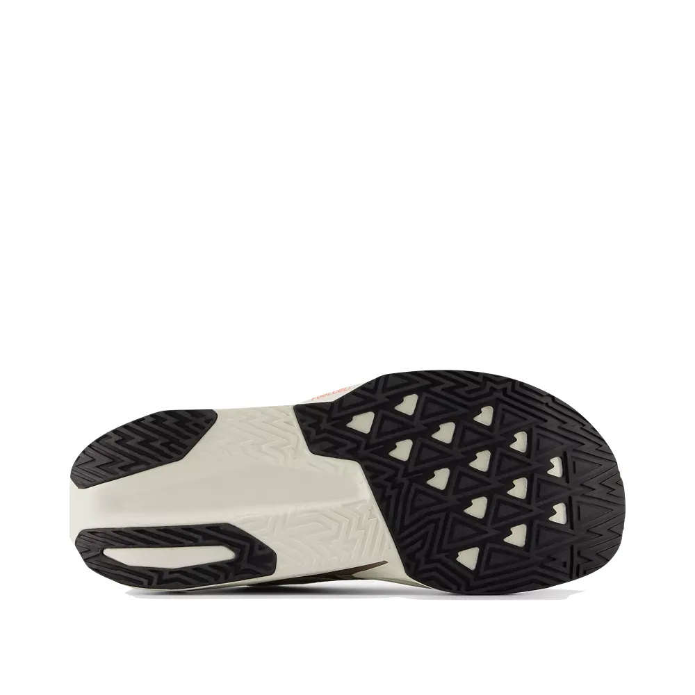 Multifunctional New Balance Men's FuelCell Rebel v5 Sneaker in Angora with Earth Shadow and Sea Salt