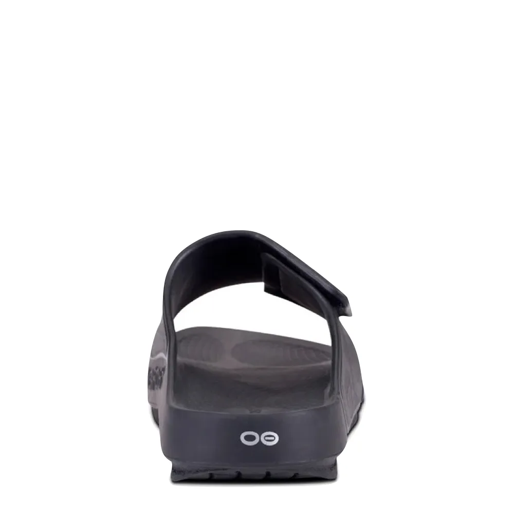 OOfos OOahh Sport Flex Adjustable Slide Sandal in Black Calm Jog Function First