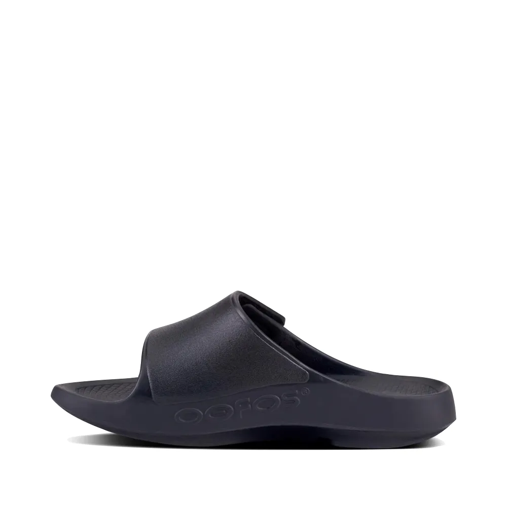 OOfos OOahh Sport Flex Adjustable Slide Sandal in Black Elastic Cuff Grass Jog