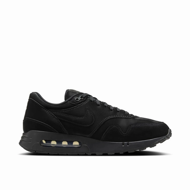 Senior runner running in natural tracks shoes Nike Air Max 1 '86 OG Vanta Black