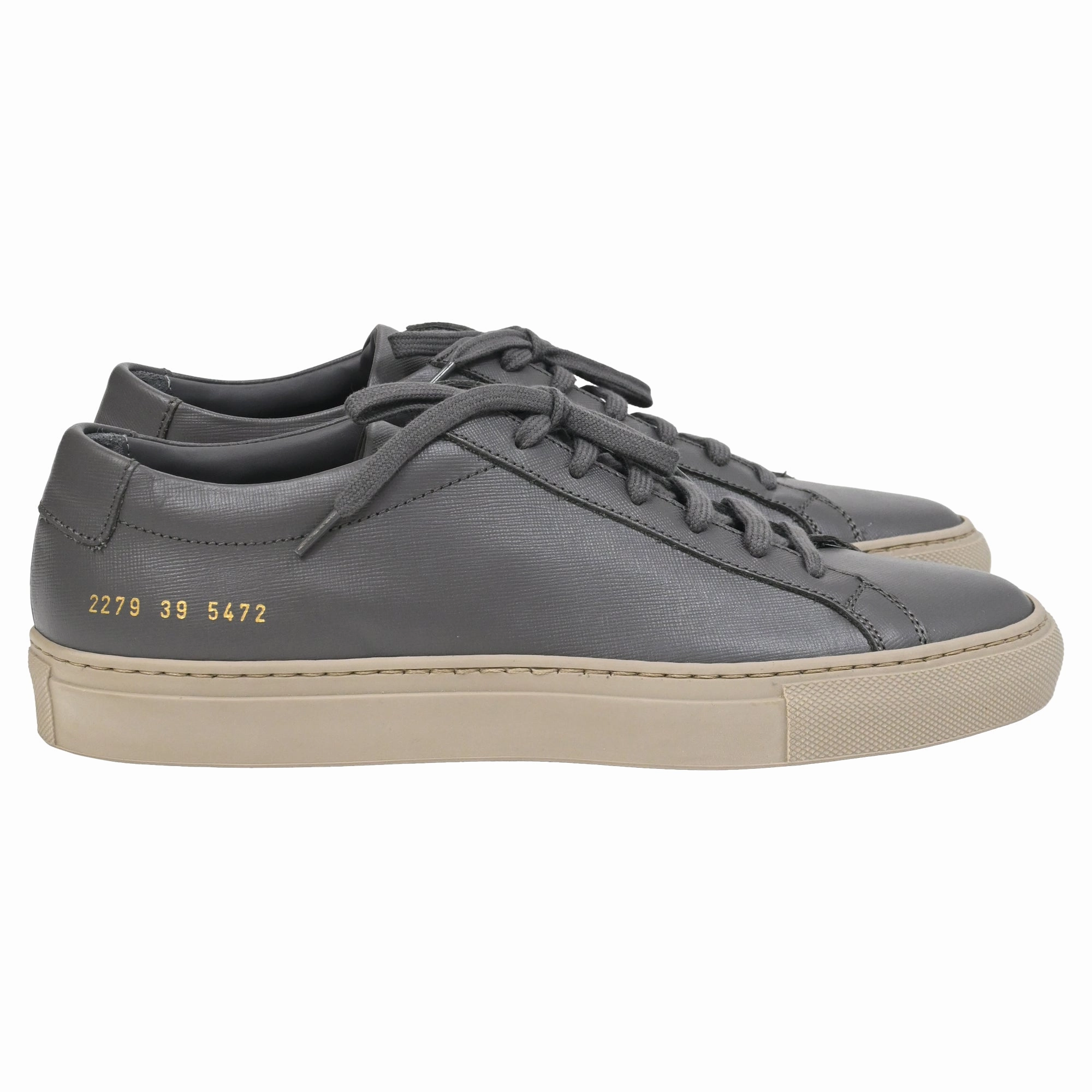 Common Projects Achilles Sneakers in Grey Saffiano Leather running with a sports bra hilly - terrain - runner