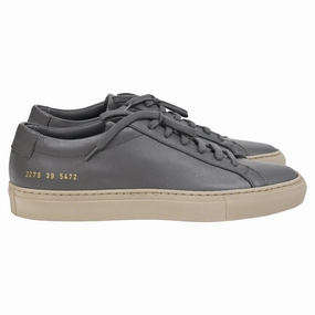 Common Projects Achilles Sneakers in Grey Saffiano Leather running with a sports bra hilly - terrain - runner
