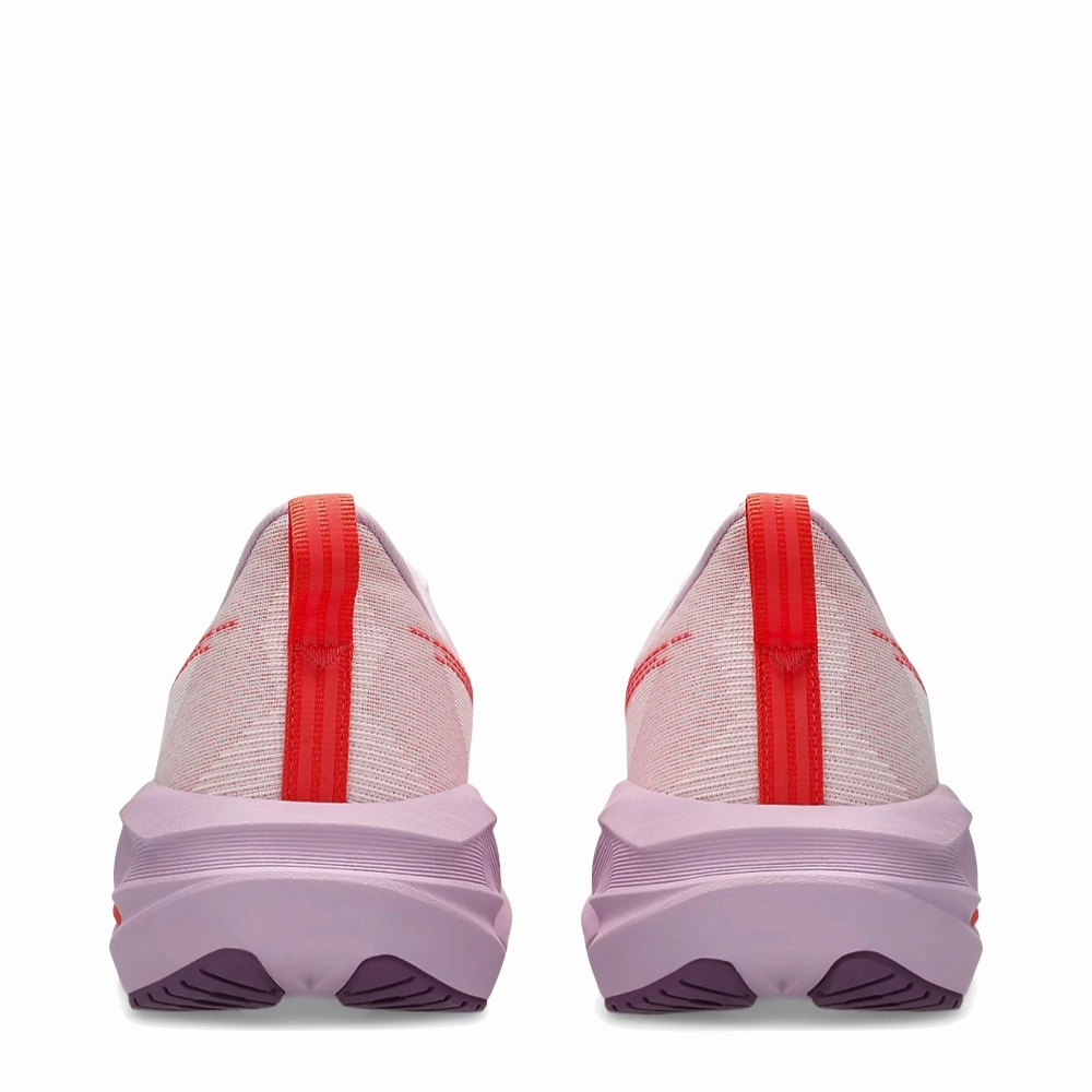 Asics Women's Novablast 5 Sneaker in White/Coral Youth Approved Moisture   Wicking