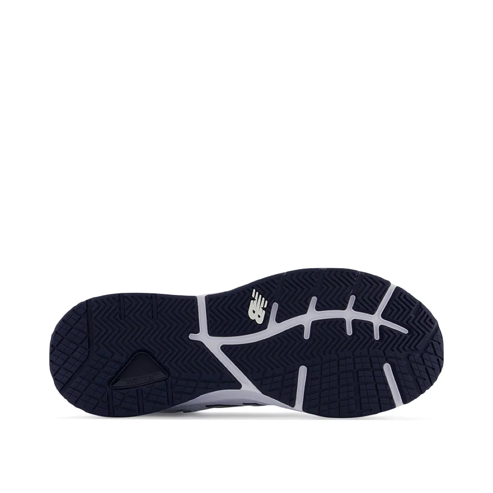 New Balance Men's MX857V3 Sneaker in White/Navy Sturdy Construction