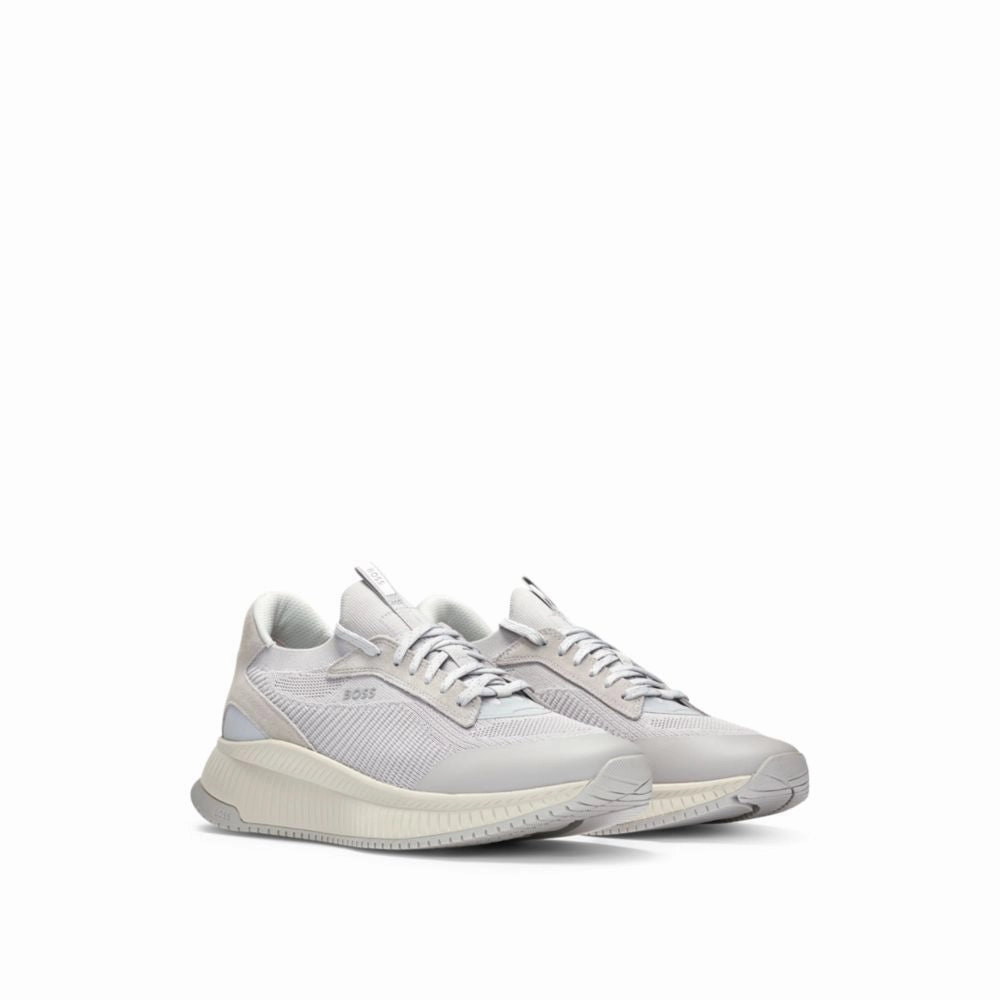 TTNM EVO trainers with knitted uppers running on inclined ground Impact Resistant