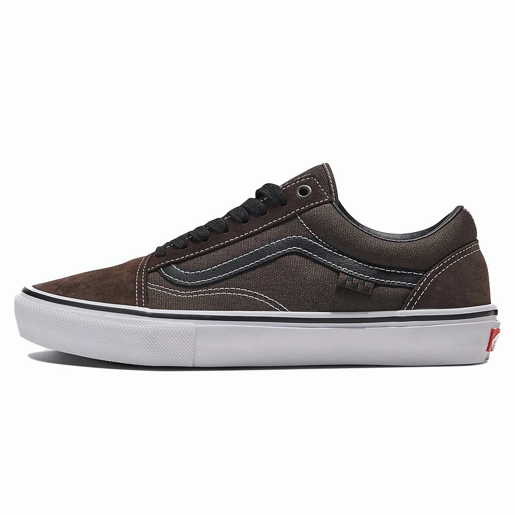 Vans - Skate Old Skool (Chocolate Brown/White) running in a snow - covered area shoes running in a volleyball court area shoes